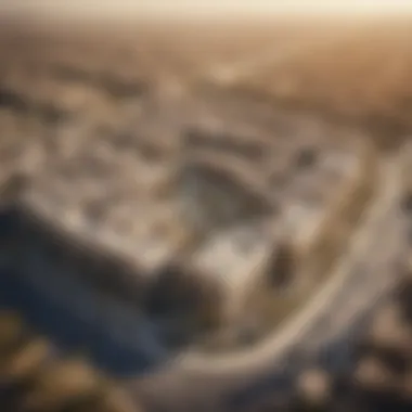 Aerial Perspective of Al Hamra's Architectural Marvels Aerial view of Al Hamra development showcasing modern architecture